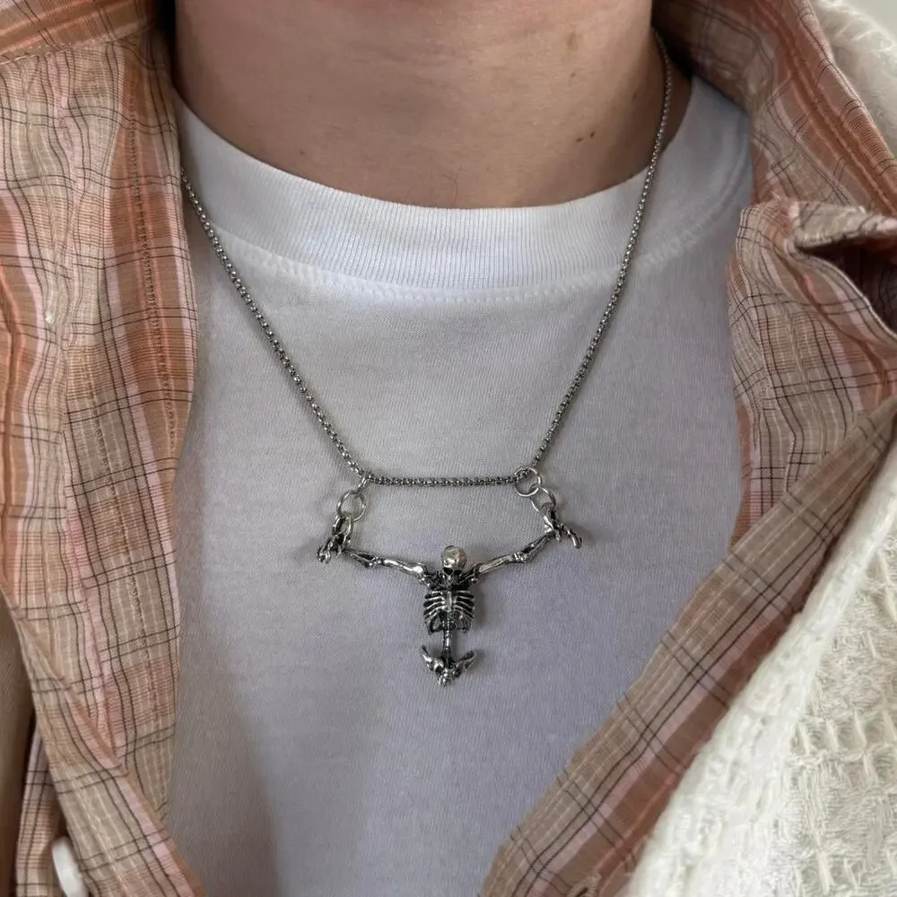 Silver skeleton necklace on a